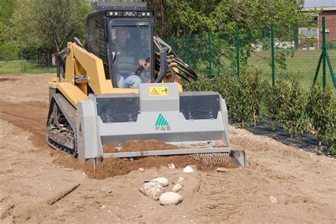 skid steer rock crusher|tractor mounted rock crusher.